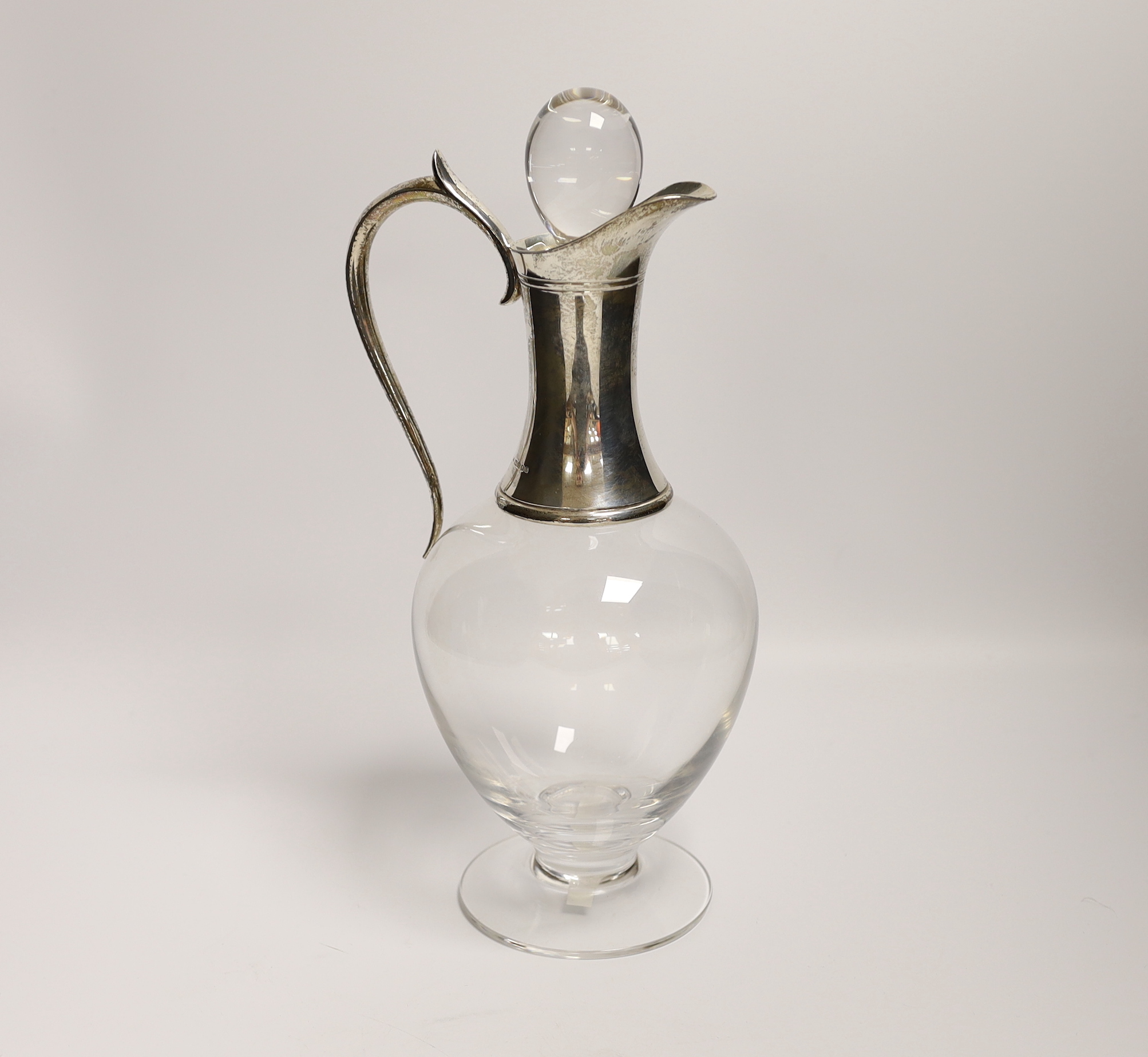 An Elizabeth II silver mounted glass claret jug and stopper, by J.A. Campbell, 2004, height 28.2 excl. stopper, in original fitted box.